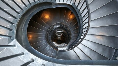 gray concrete spiral stairs with no people