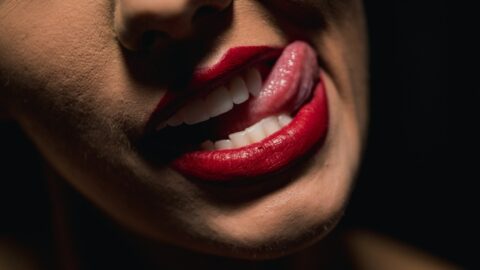 woman with red lipstick and red lipstick